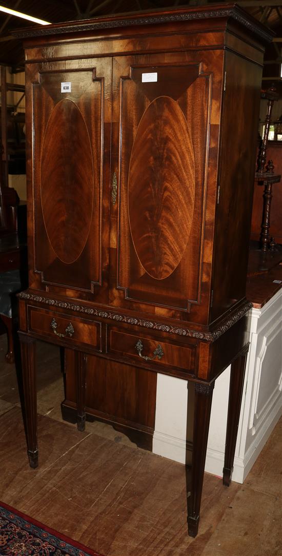 Inlaid mahogany cabinet with drawers below(-)